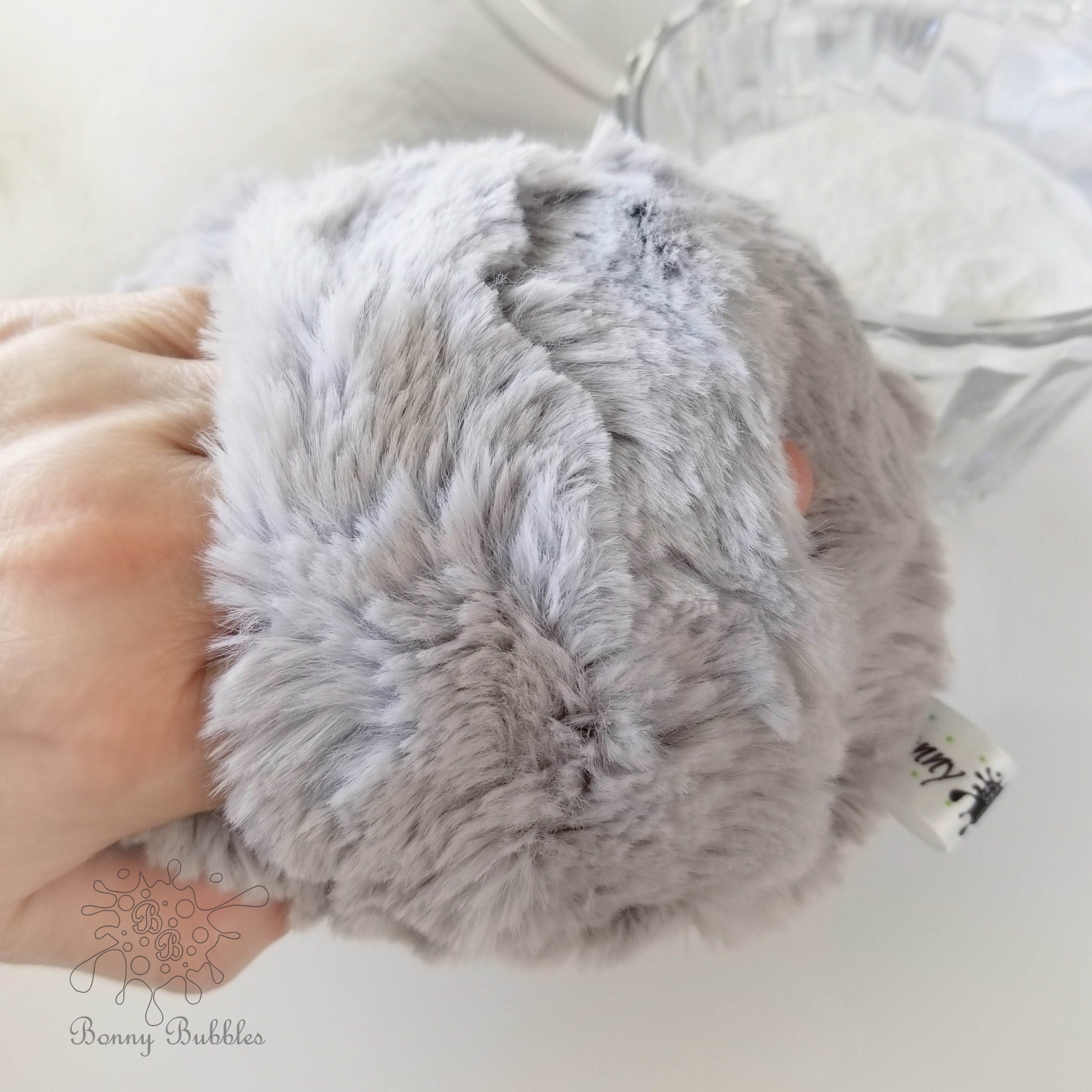 grey powder pouf